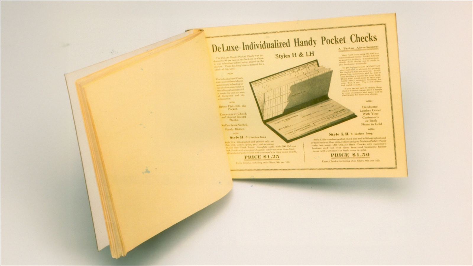 The Deluxe Little Handy pocket checkbook