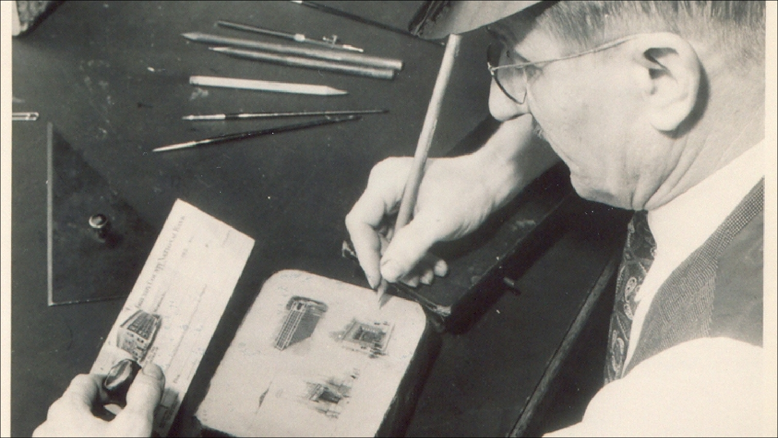 An early Deluxer works with a lithographic press