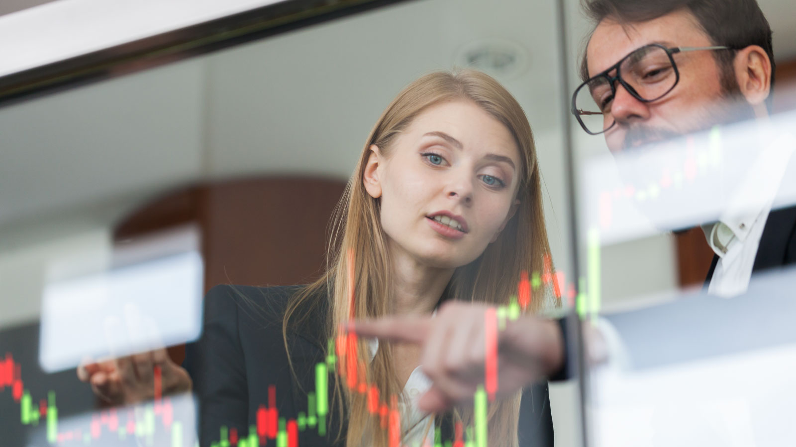 business team looking at charts