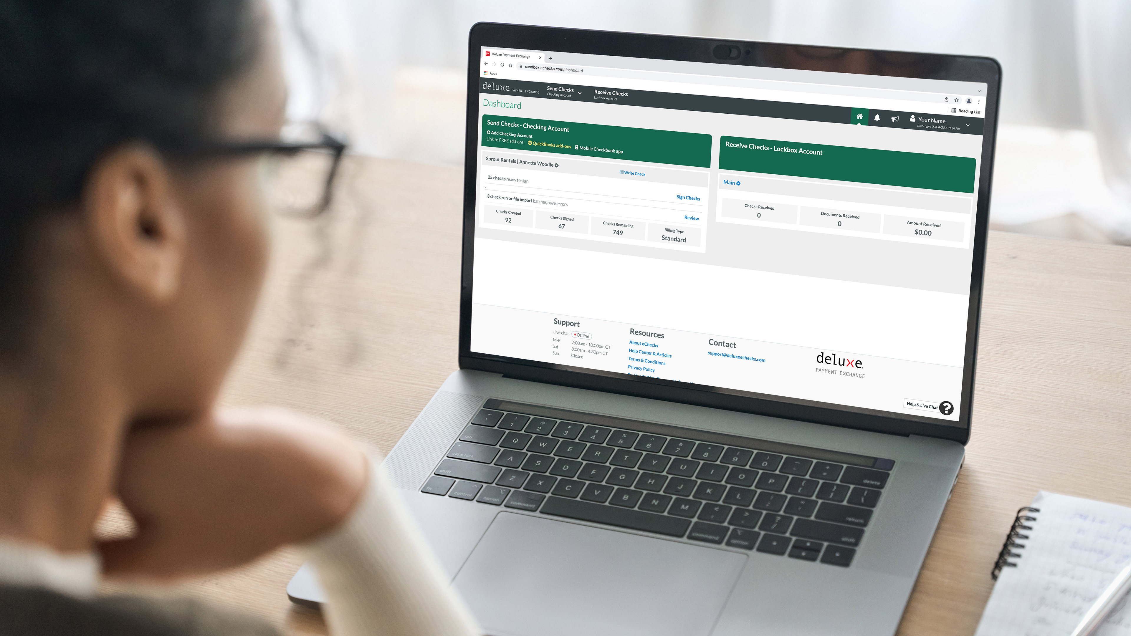 Customer looking at their Deluxe Payment Exchange account