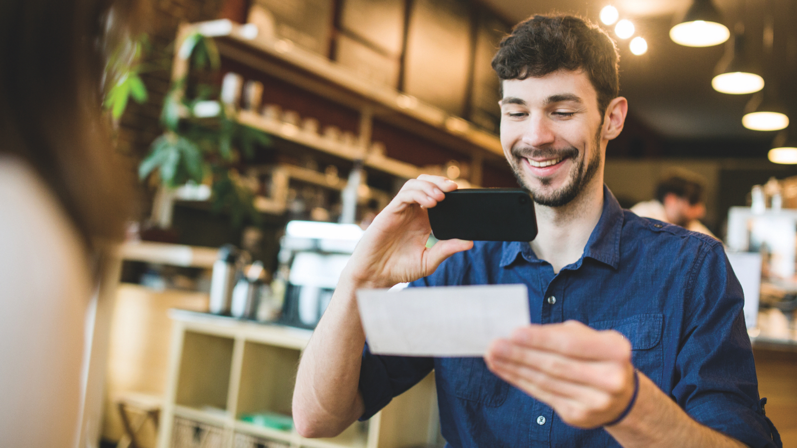 A man using mobile remote deposit capture.
