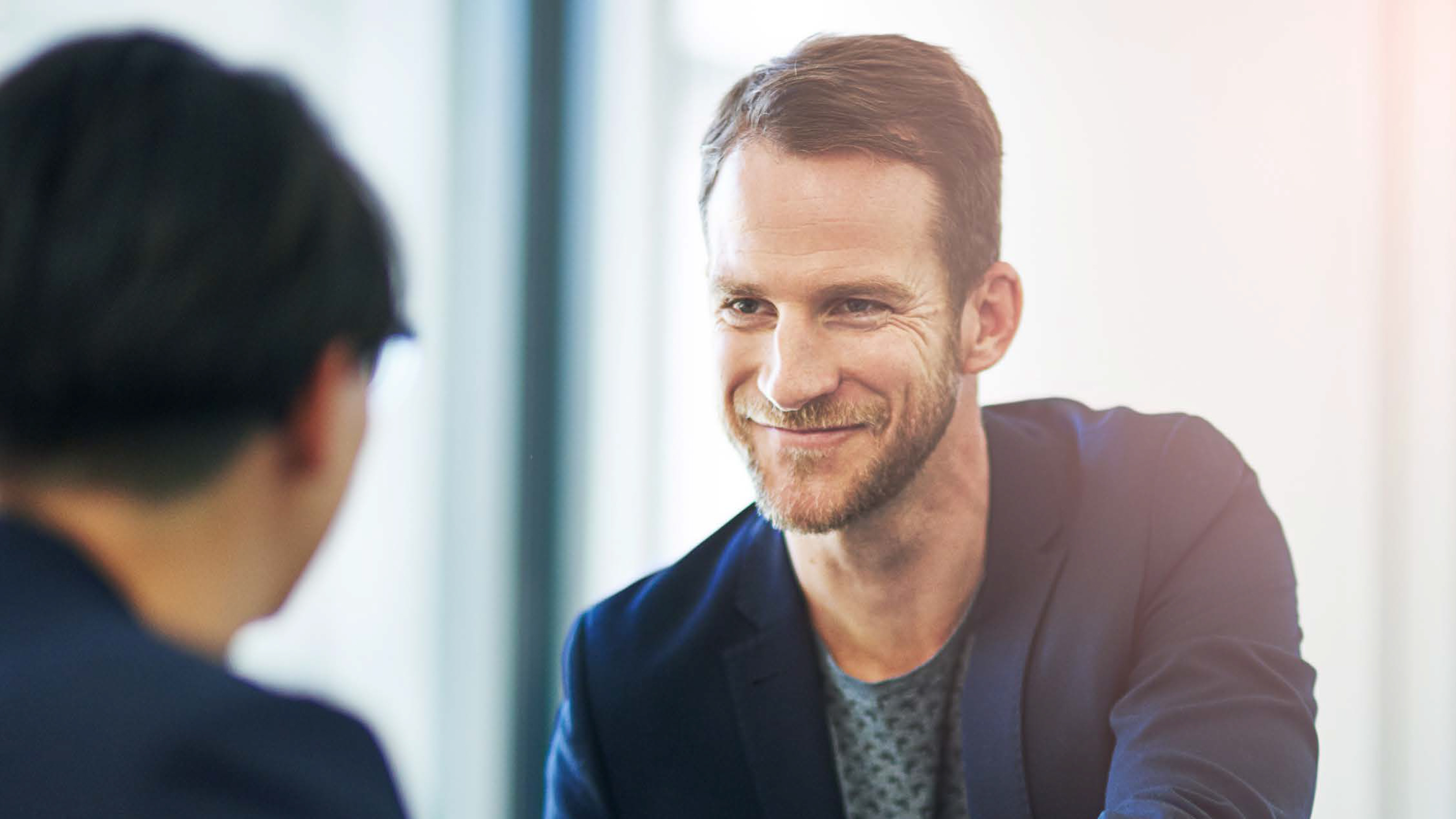 Two business associates chatting